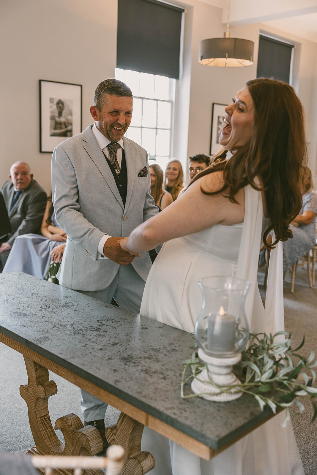 Couple laughing during ceremony