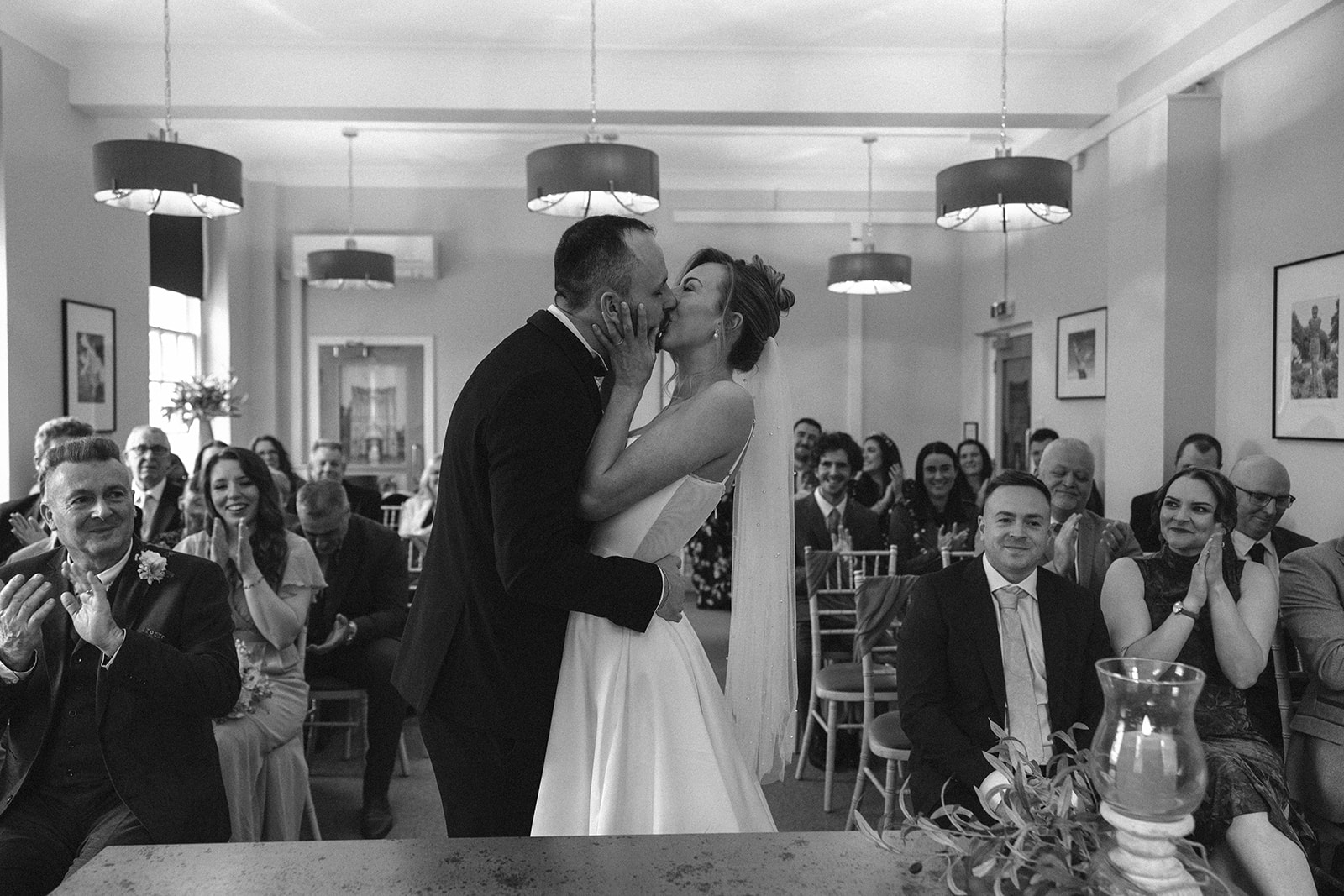 Bride and groom kissing