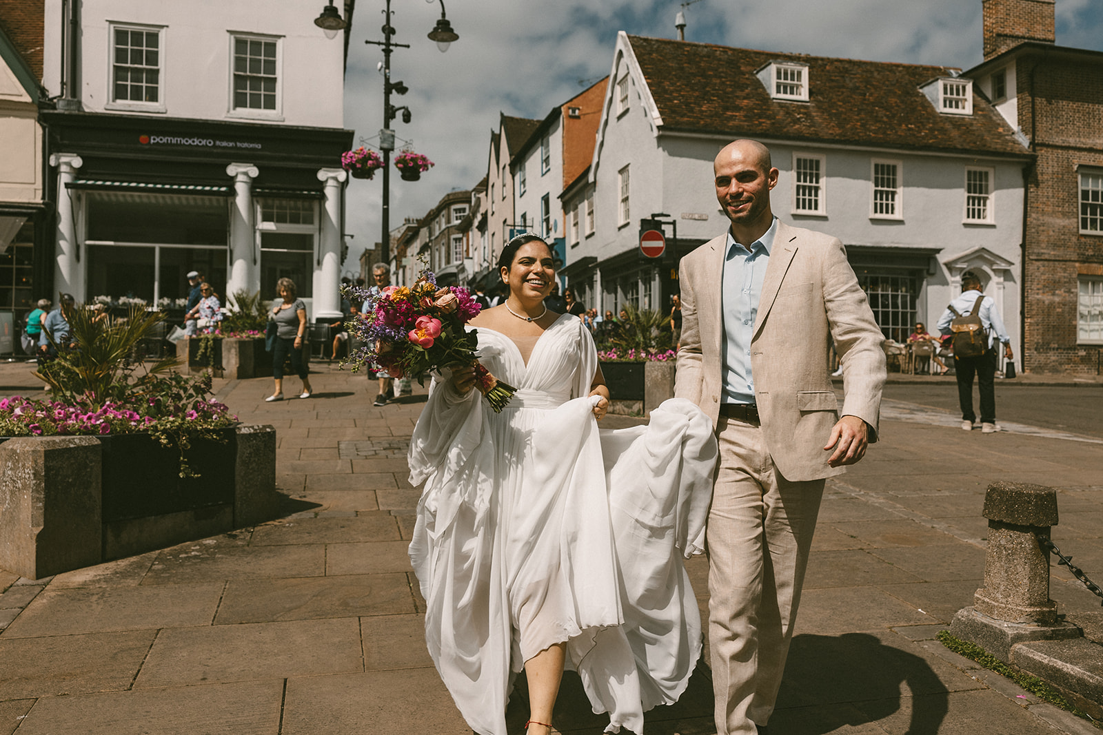 Couple walking market hill Bury St Edmunds