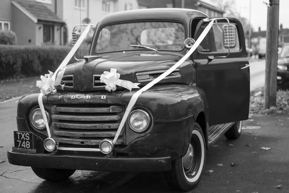 A vintage American truck, parked outside Ipswich Tow Hall and ready for the bride’s and groom's arrival.