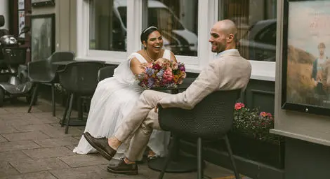 Couple sitting outside cinema