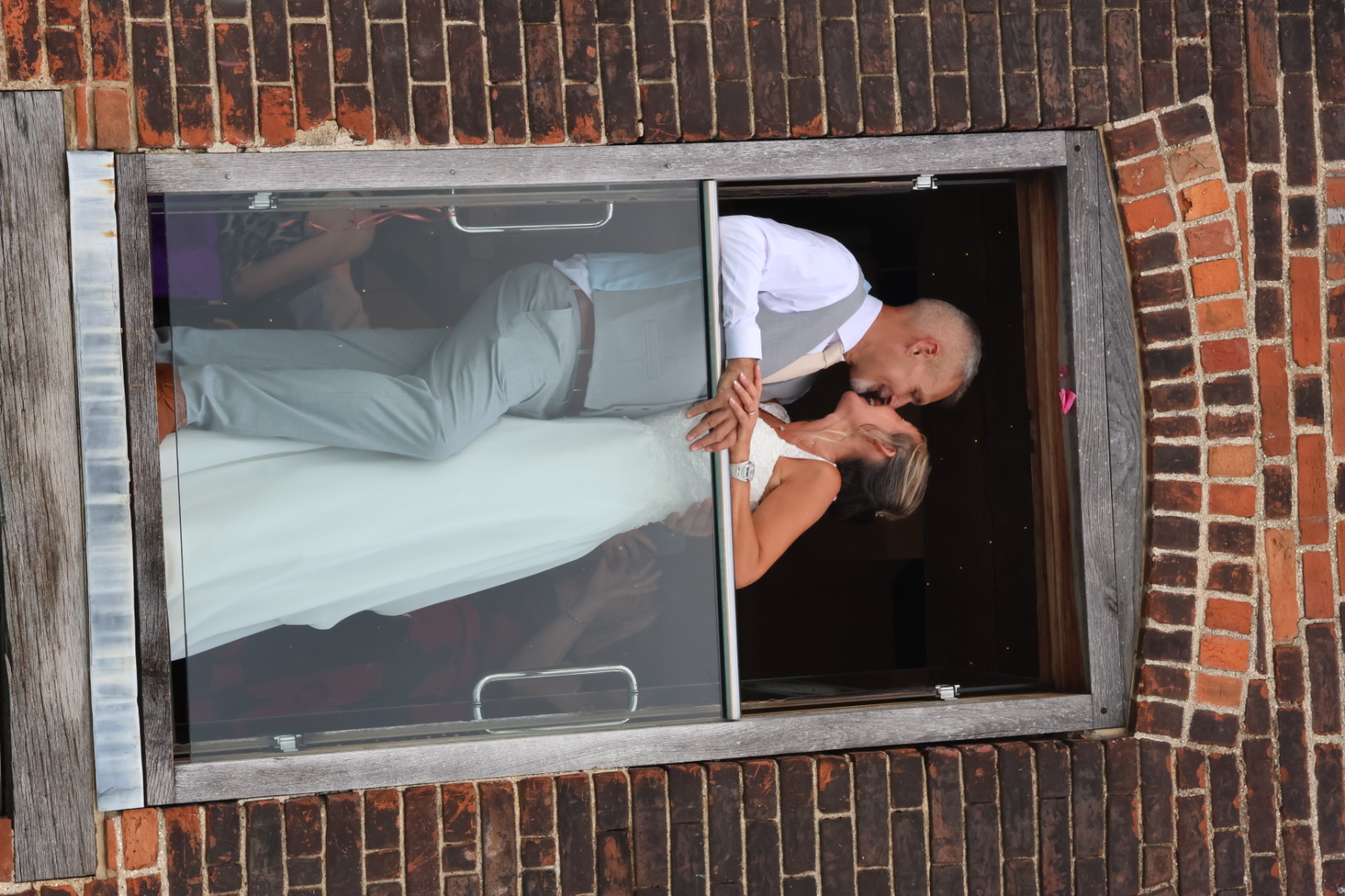 Bride and Groom on Isaacs Ipswich balcony