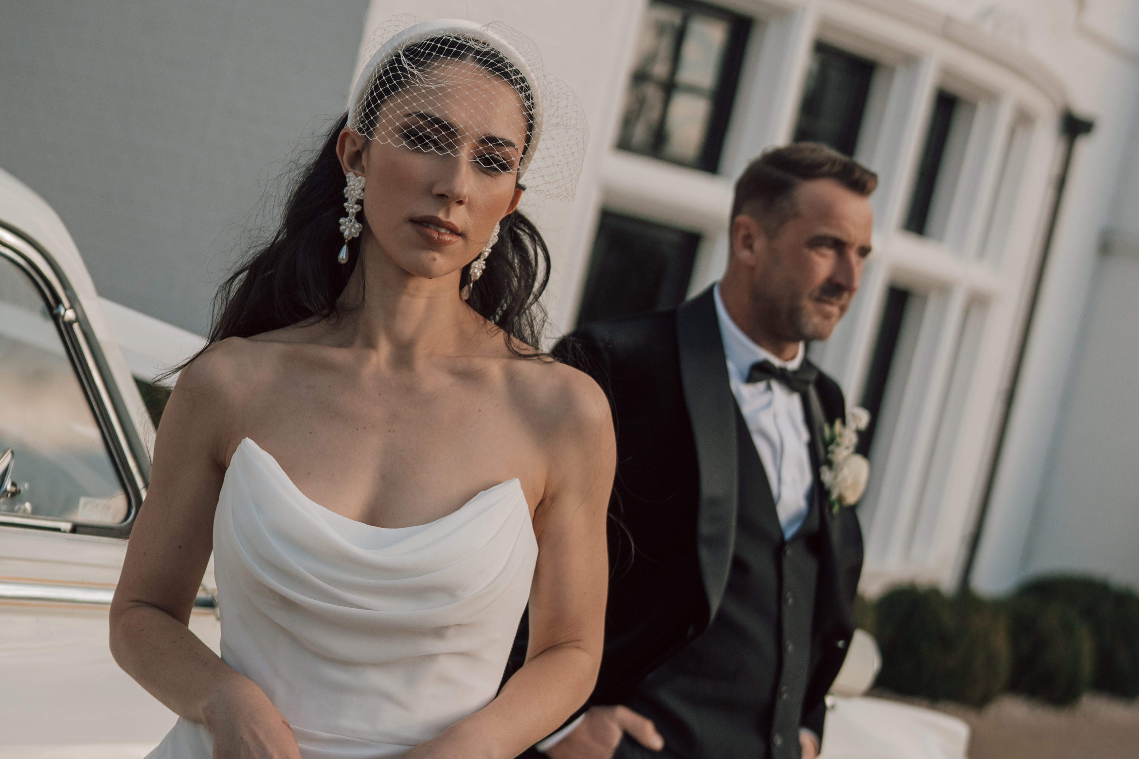 Bride and groom looking stern