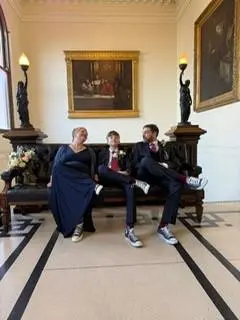 Bride and Groom relaxing together with their teenage son after their Ipswich Town Hall wedding