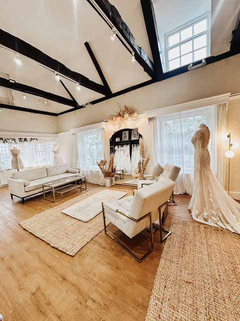 Lavender and Jude bridal boutique inside white and cream interior sofas and chairs