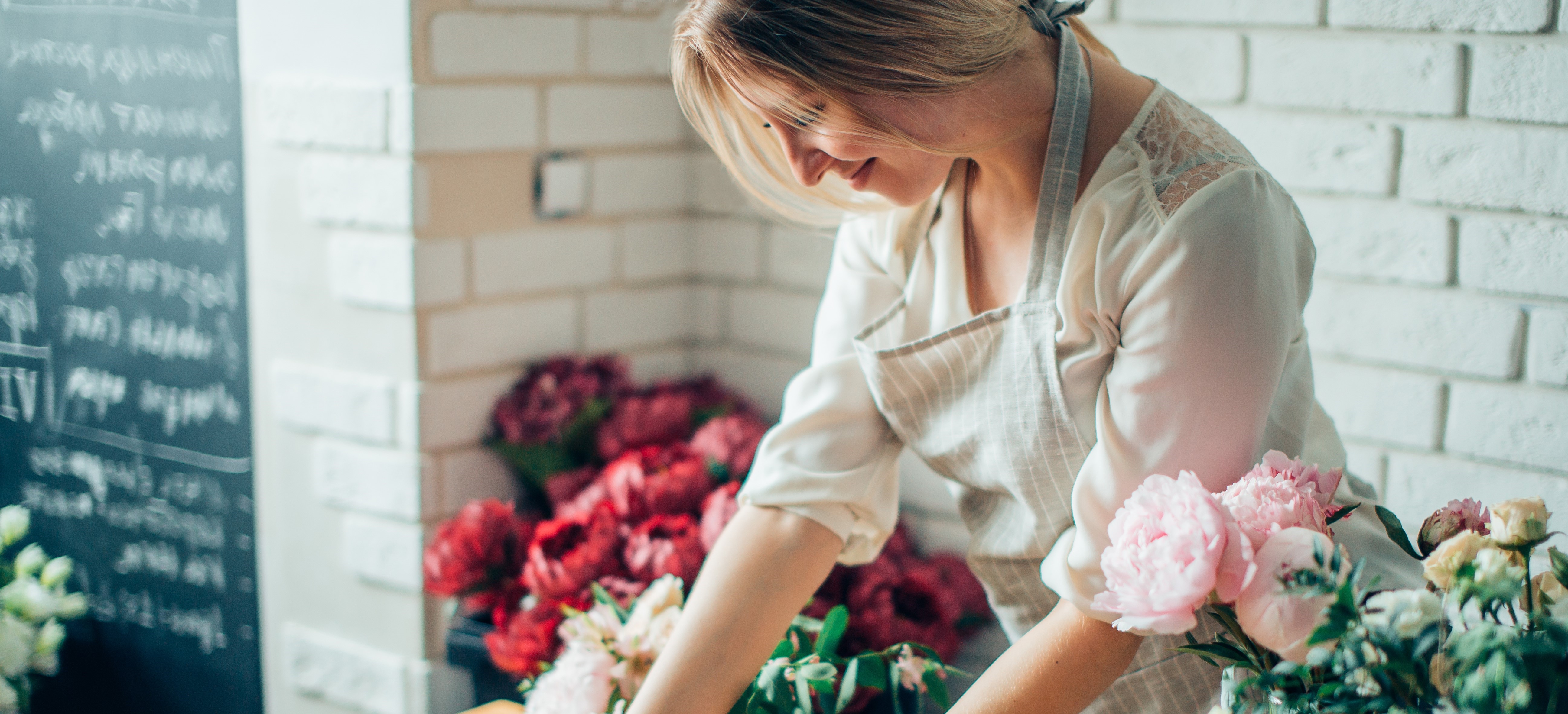 Florist arranging flowers.