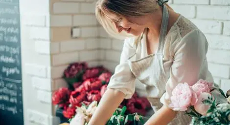 Florist arranging flowers.