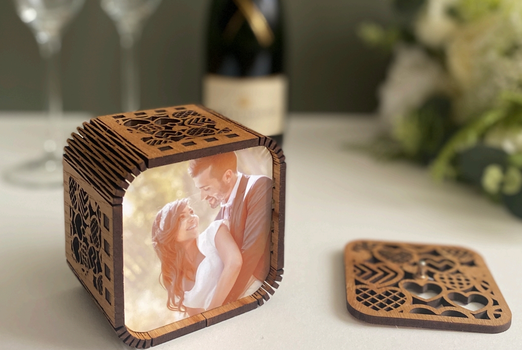 Photo box showing smiling bride and groom