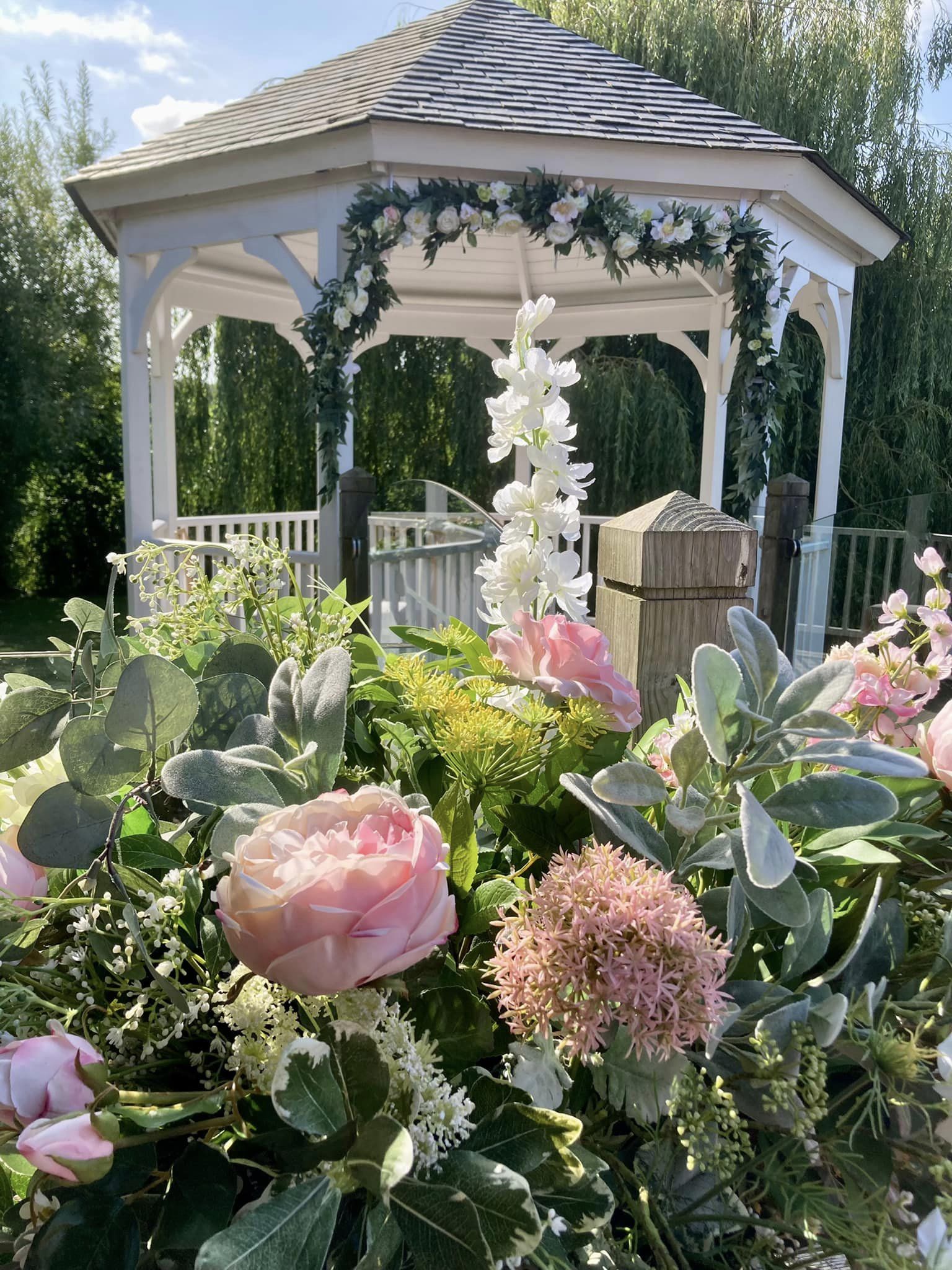 Beautiful bouquet outside a garden structure