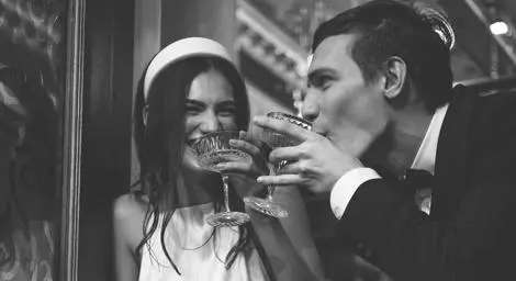 Bride and groom enjoying cocktail