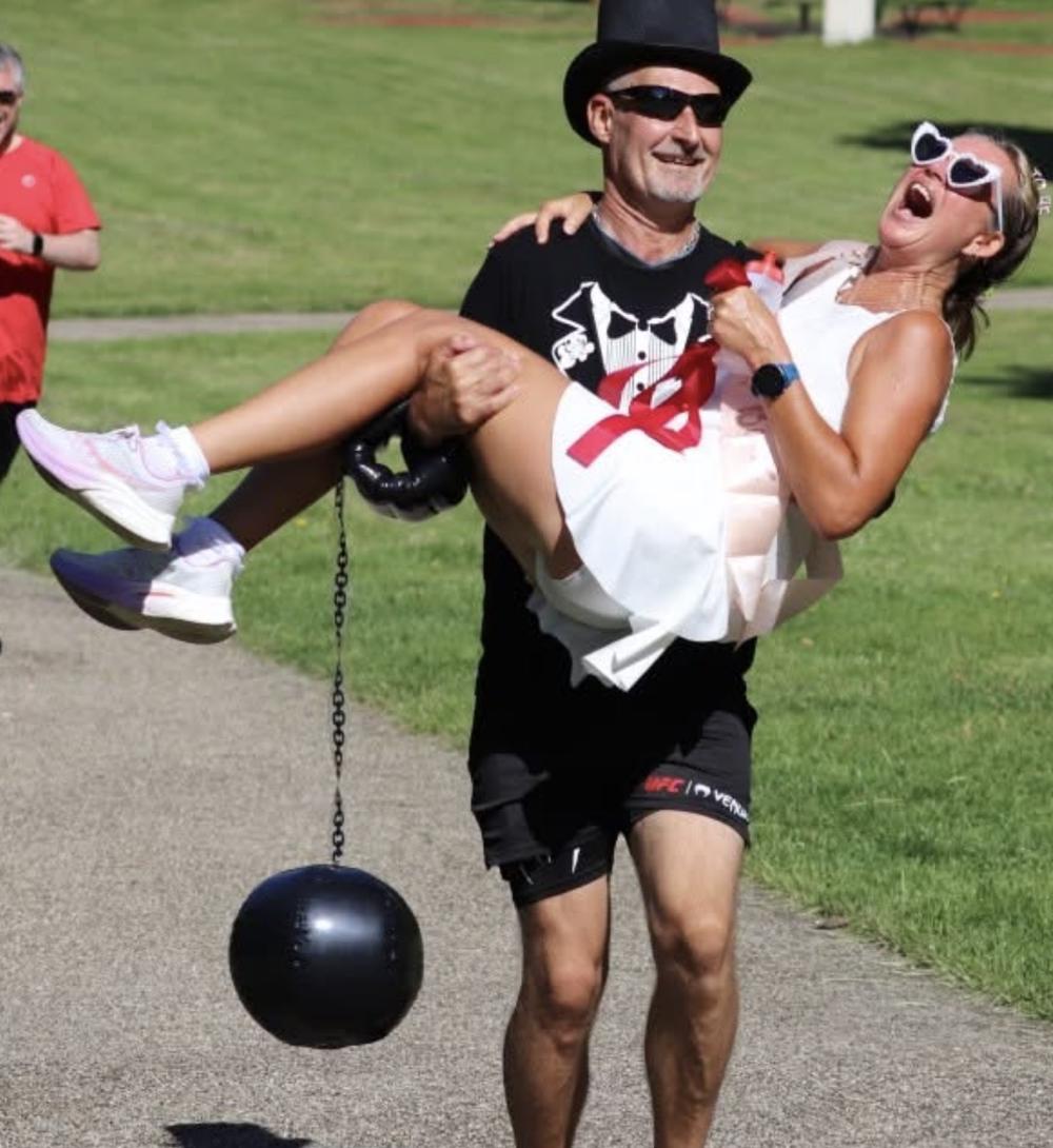 Bride and groom doing park run