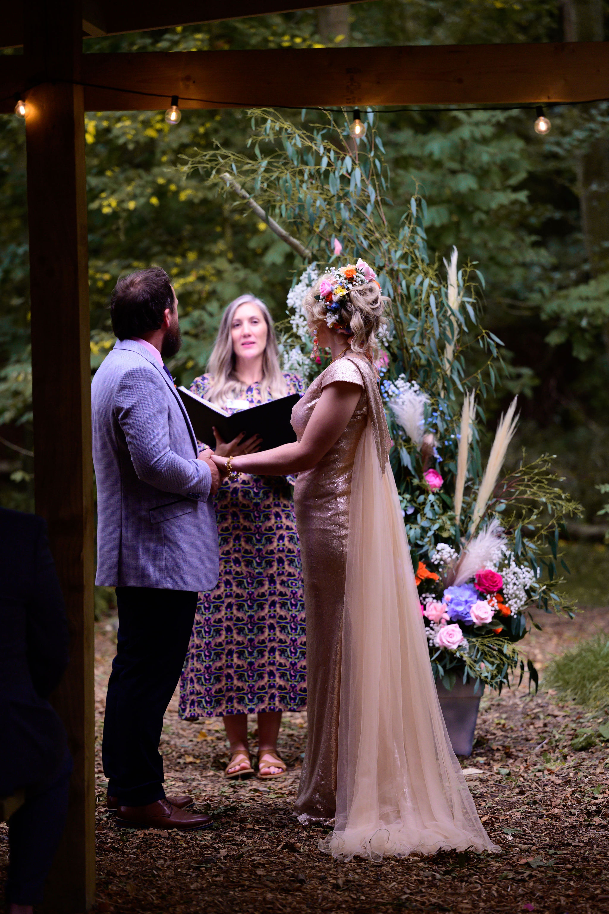 Bride and groom during outdoor ceremony
